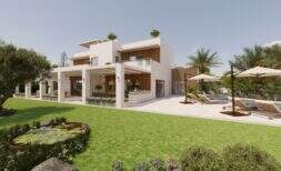 Villa de diseño moderno en Cala Murada con piscina, terraza soleada, estanque de jardín y vegetación exuberante