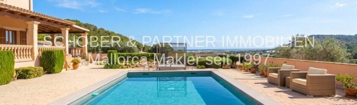 Spacious outdoor pool with panoramic views of Son Servera, Mediterranean finca with terrace and lounge furniture
