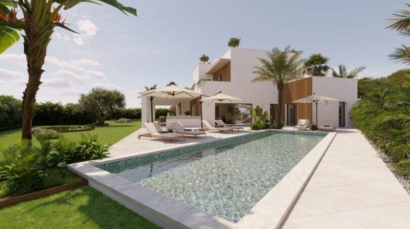 Moderne Designvilla in Cala Murada mit rechteckigem Pool, Sonnenliegen, Sonnenschirmen und tropischem Garten.