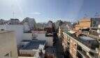 Panoramablick vom Dachterrasse der Penthouse-Maisonette über die Dächer Palmas mit Bergen im Hintergrund
