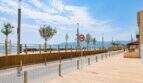 Strandpromenade Portixol mit Meerblick, Palmen und 30-km/h-Zone nahe der Wohnung in Palma de Mallorca