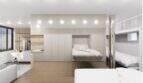 Modernes Designer-Loft mit Doppelstockbett, Wandbett, offener Küche und hellem Wohnbereich in Palma