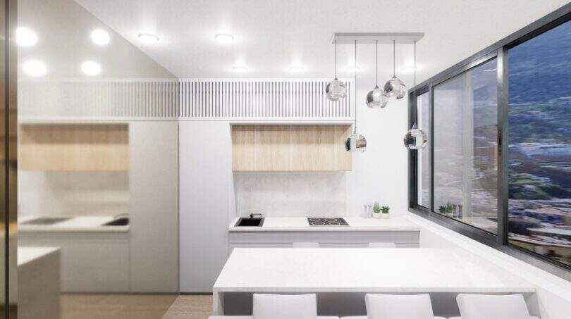 Modernes Penthouse-Loft in Palma: offene Designerküche in Weiß mit Panoramafenster und Stadtblick