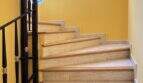 Elegant staircase solution with high-quality handrails and optimal lighting