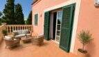 Sun terrace with French double doors and elegant balustrade