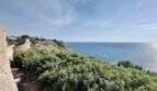 Sa Torre is located on a steep coastline with crystal clear water