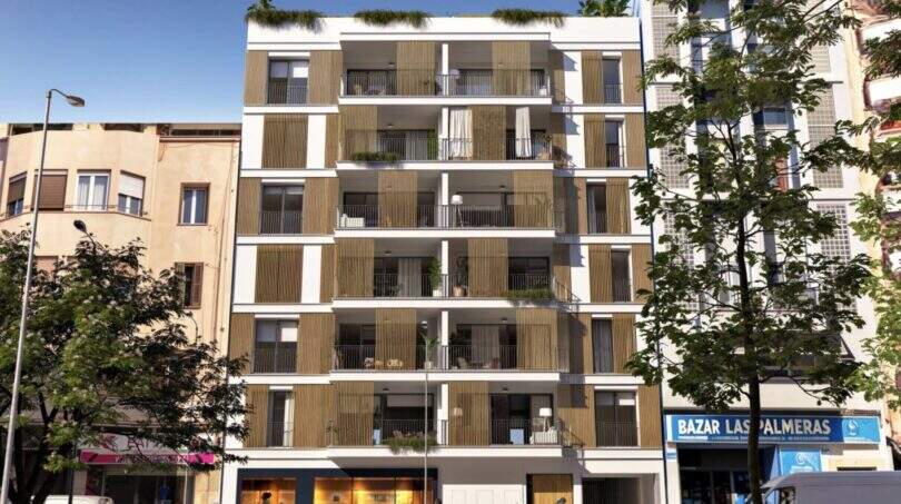 Modern New Building in Palma with Wood Slat Facade, Balconies, and Green Plants in Urban Downtown Location