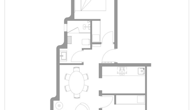 Plano de un apartahotel de 63 m² en Portocolom con 2 dormitorios, sala de estar-comedor y balcones.