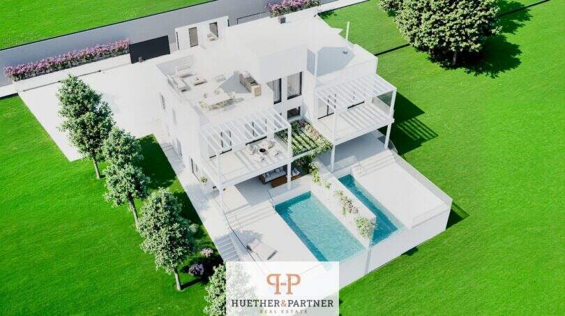 Luftansicht moderner Neubau-Doppelhaushälfte in Cala d'Or mit privatem Pool, Terrassen und gepflegtem Garten.