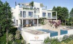 Moderno chalet pareado de nueva construcción en Cala d'Or con piscina infinita, terraza y exuberante vegetación