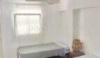 Helles Schlafzimmer mit zwei Einzelbetten, Deckenventilator und Holzboden in renovierter Wohnung, Playa de Palma