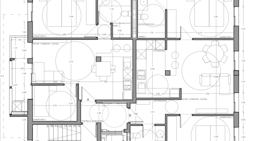 Plano de planta de un apartamento en Palma con dos dormitorios, cocina-comedor, dos baños y cuarto de lavandería.