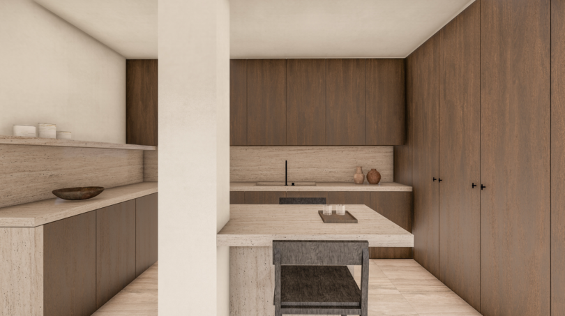 Cocina minimalista con frentes de madera, encimeras de travertino e isla de cocina en Palma de Mallorca