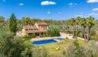 Aerial view of the finca near Campos with large pool, palms and Mediterranean garden