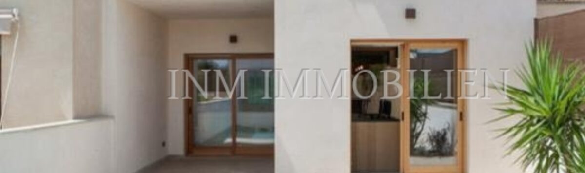 Exterior of the luxury new build village house in Biniali with private pool, terrace and green shutters