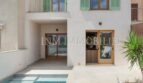 Exterior of the luxury new build village house in Biniali with private pool, terrace and green shutters