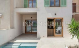Exterior of the luxury new build village house in Biniali with private pool, terrace and green shutters