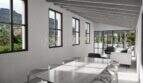 Zona de estar luminosa con techo de vigas, grandes ventanas y vistas panorámicas al Valle de Sóller, mobiliario moderno