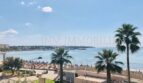 Meerblick-Wohnung in El Arenal: Panoramablick auf Strand, Palmen und türkisblaues Mittelmeer in Palma.