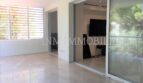 Bright terrace area with marble floor and large sliding glass doors to the living room, penthouse Bendinat