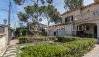 Gepflegter Garten mit Steinbrunnen und mediterraner Villa mit Balkon in Marratxí